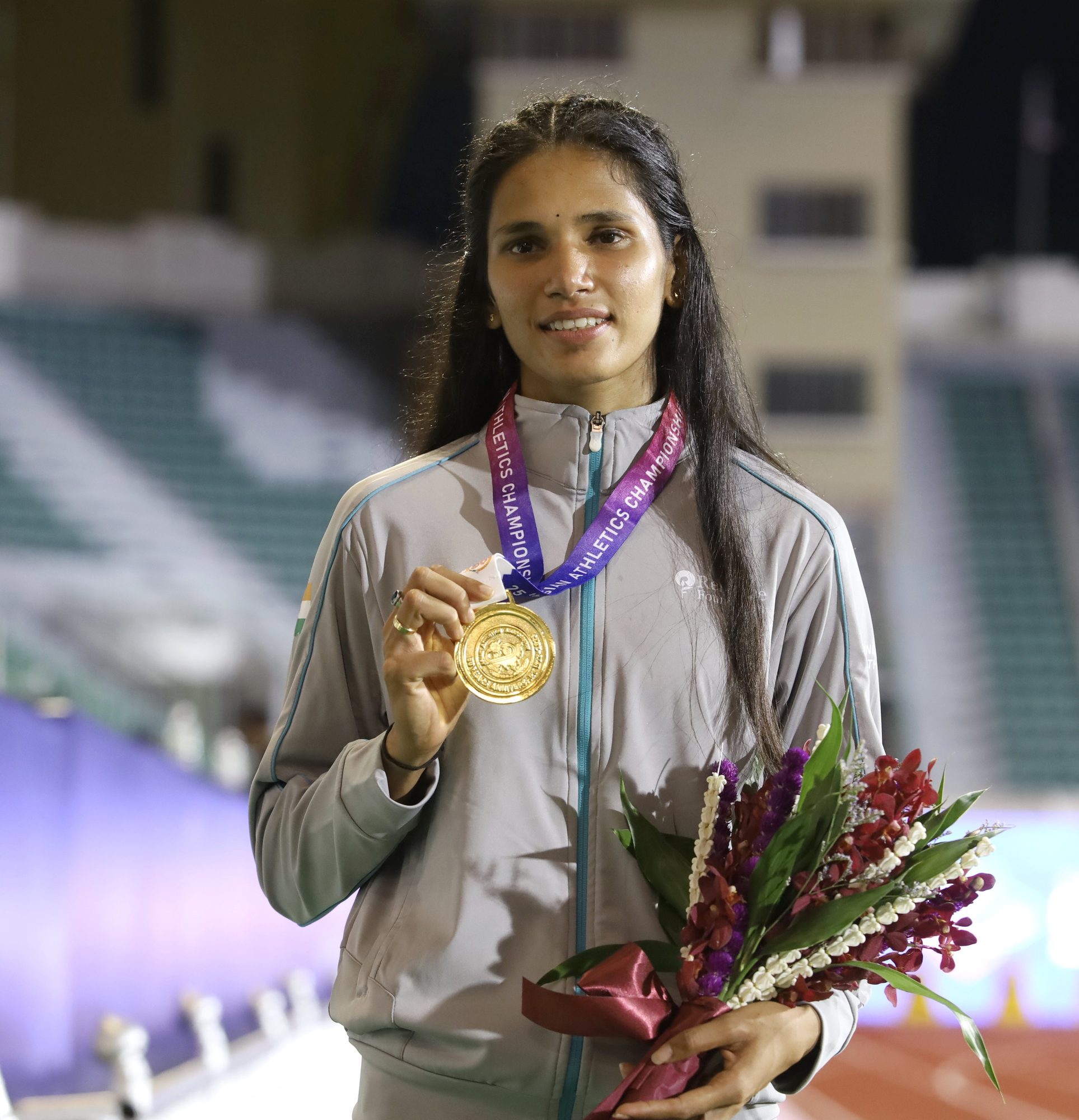 Jyothi Yarraji with her Asian Athletics Championship gold medal